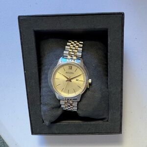 Bulova women’s Goldtone and Silver Watch